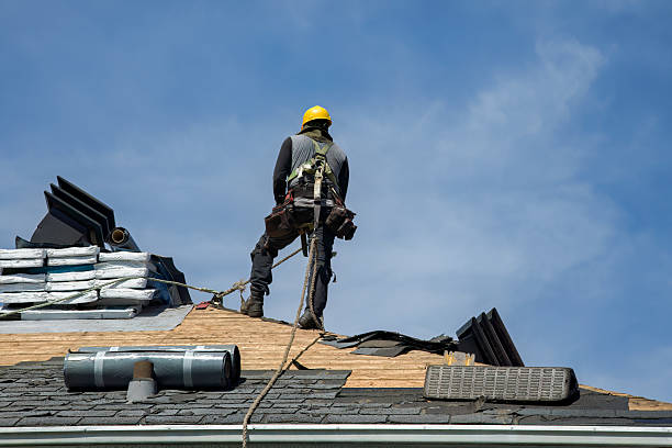 Professional Gutter Installation technician working in Britt, IA
